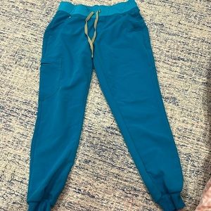 Lightly used figs Zamora jogger. Teal size small
